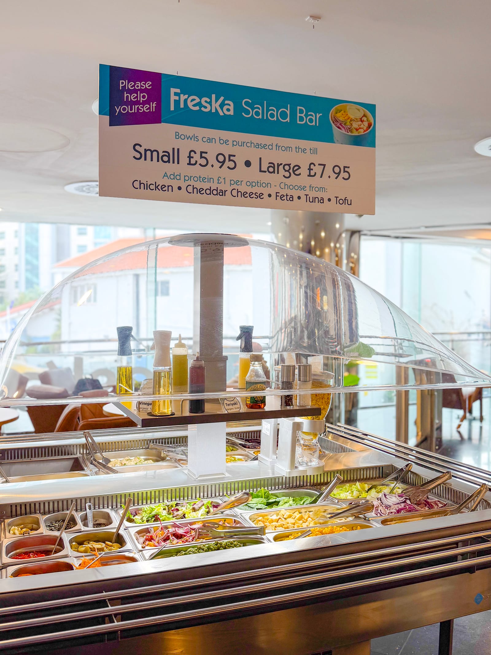 Freska Salad Bar sign above the self-serve salad counter
